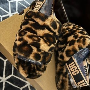 Selling cheetah, print, Ugg slides never worn